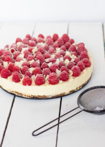Witte chocolade cheesecake met lemoncurd & frambozen